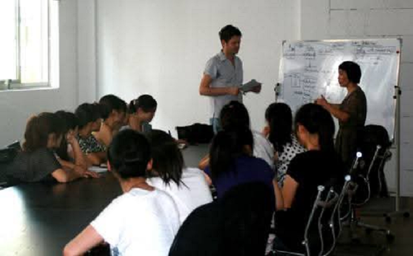 Leading a strategic meeting on operational excellence and sustainability.